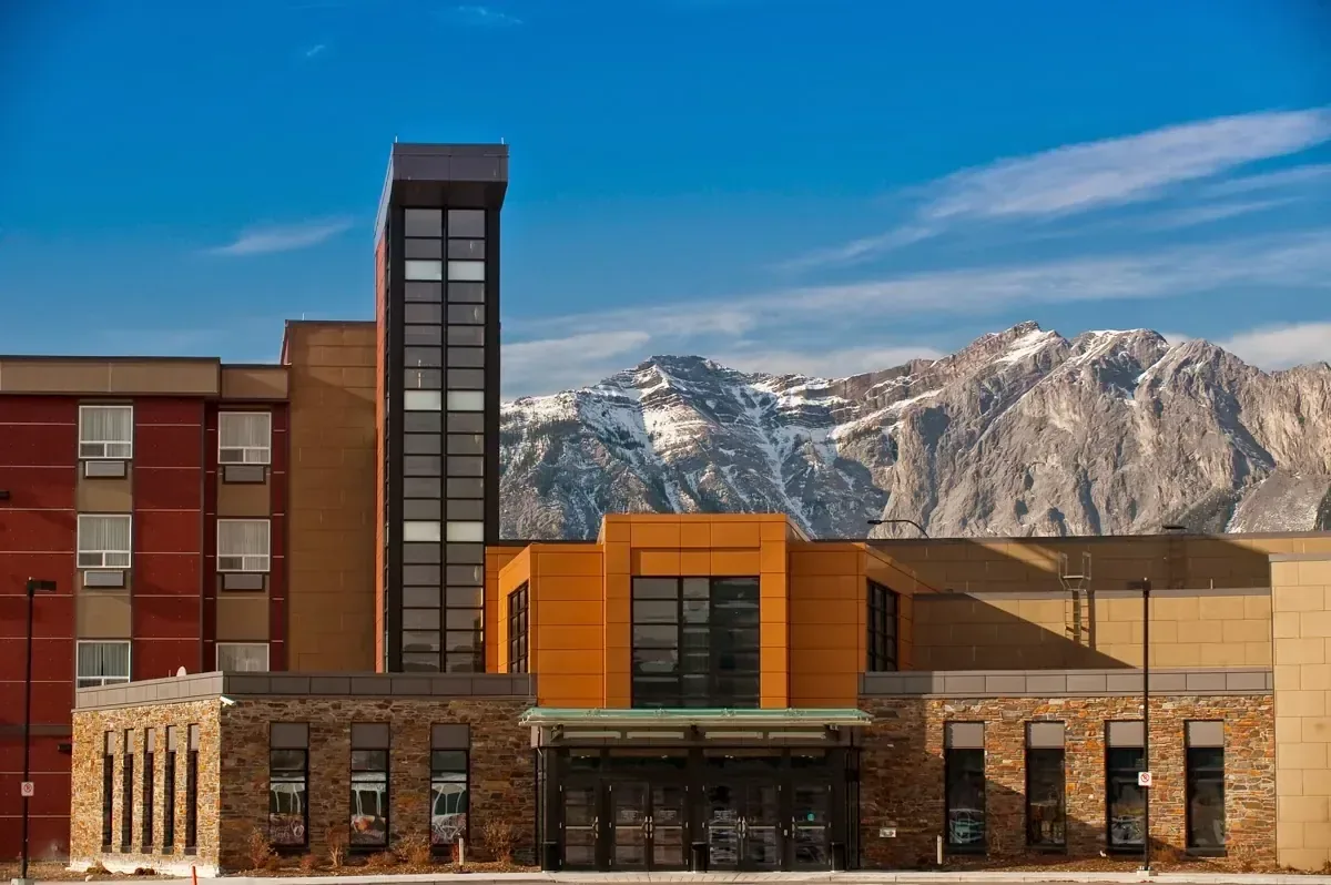 Resort building against a wide landscape